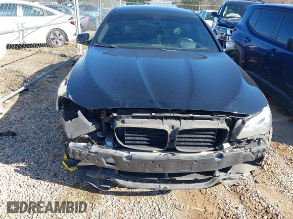 2013 BMW 5 Series 535i with VIN WBAFR7C57DC817337, listed as a IAAI auction lot 41265667 with 148,953 mi miles and . Bid and sale history available at DreamBid. Image 13.