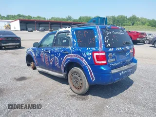 2011 Ford Escape XLT with VIN 1FMCU9D70BKA12908, listed as a IAAI auction lot 42425419 with 286,179 mi miles and . Bid and sale history available at DreamBid. Image 3.