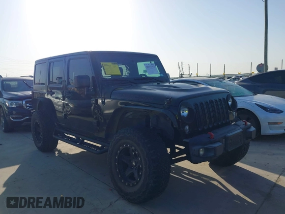 2015 Jeep Wrangler Unlimited Rubicon Hard Rock with VIN 1C4HJWFG7FL602344, listed as a IAAI auction lot 42011914 with 109,238 mi miles and . Bid and sale history available at DreamBid. Image 13.