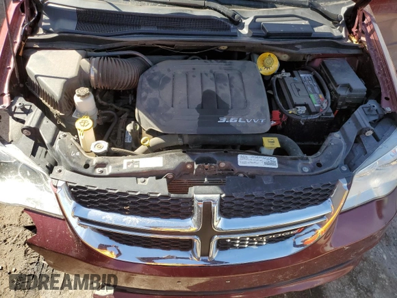 2017 Dodge Grand Caravan SE z VIN 2C4RDGBG8HR780460, wystawiony jako Copart lot #46663825 z przebiegiem 90 157 mil mil oraz Szkody całkowita. Historia ofert i sprzedaży dostępna na DreamBid. Obrazek 14.