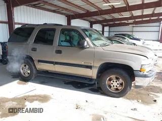 2001 Chevrolet Tahoe LT with VIN 1GNEK13T91J286994, listed as a IAAI auction lot 41416029 with 203,341 mi miles. Bid and sale history available at carsss.com. Image 13.