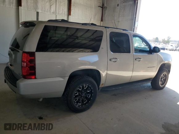 2009 Chevrolet Suburban 2LT с VIN 1GNFK26399J118063, выставлен на аукционе Copart как лот 47014765 с пробегом 239 209 миль миль и Списание • Salvage title. История ставок и продаж доступна на DreamBid. Изображение 3.