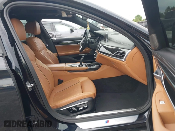 2017 BMW 7 Series ALPINA B7 xDrive with VIN WBA7F2C51HG422066, listed as a IAAI auction lot 42496292 with 118,235 mi miles and . Bid and sale history available at DreamBid. Image 5.