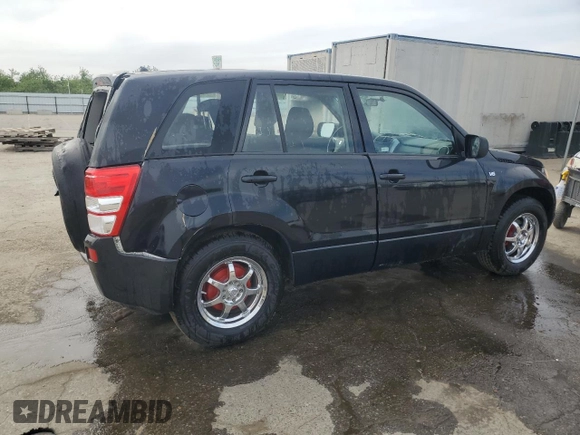 2007 Suzuki Grand Vitara with VIN JS3TE941474202110, listed as a Copart auction lot 52110865 with 132,661 mi miles and Salvage title. Bid and sale history available at DreamBid. Image 3.