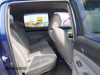 2014 Toyota Tacoma with VIN 3TMLU4EN0EM153558, listed as a IAAI auction lot 41964890 with 140,864 mi miles and . Bid and sale history available at DreamBid. Image 8.