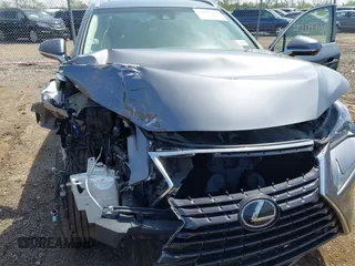 2019 Lexus NX with VIN JTJBARBZ0K2182616, listed as a IAAI auction lot 42097649 with 61,507 mi miles. Bid and sale history available at carsss.com. Image 6.