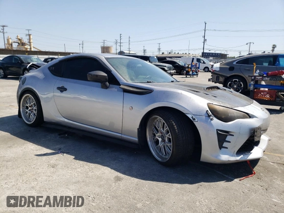2017 Toyota 86 with VIN JF1ZNAA11H9710365, listed as a Copart auction lot 60167844 with 35,795 mi miles and Salvage Title. Bid and sale history available at carsss.com. Image 4.