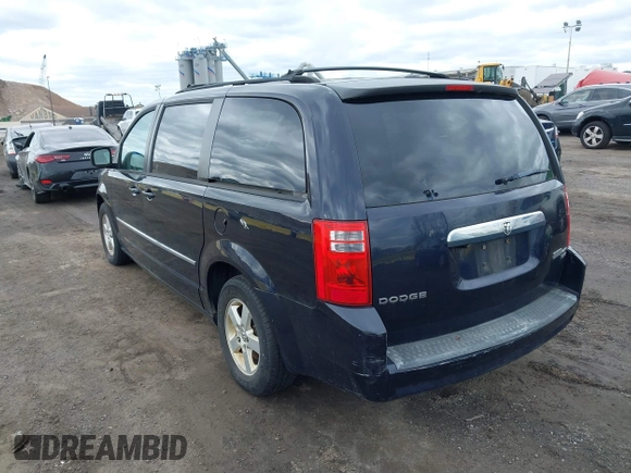 2010 Dodge Grand Caravan SXT with VIN 2D4RN5D13AR426980, listed as a IAAI auction lot 42035672 with 162,584 mi miles and . Bid and sale history available at DreamBid. Image 3.