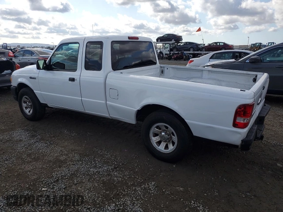 2011 Ford Ranger with VIN 1FTLR1EE1BPA11001, listed as a Copart auction lot 42980965 with 273,309 mi miles and Salvage Title. Bid and sale history available at DreamBid. Image 2.