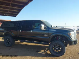 2015 Ford Super Duty F-250 SRW Lariat with VIN 1FT7W2BT6FEC13580, listed as a IAAI auction lot 41466639 with 196,761 mi miles. Bid and sale history available at carsss.com. Image 13.