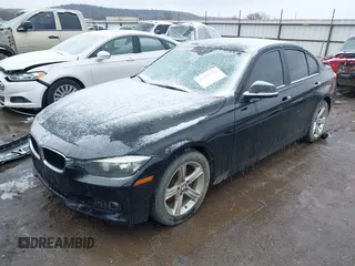 2012 BMW 3 Series 328i with VIN WBA3A5C56CF348558, listed as a IAAI auction lot 41541776 with 138,245 mi miles. Bid and sale history available at carsss.com. Image 2.