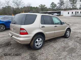 2003 Mercedes-Benz M-Class 3.2L with VIN 4JGAB54E43A383811, listed as a IAAI auction lot 41204136 with 209,327 mi miles. Bid and sale history available at carsss.com. Image 4.