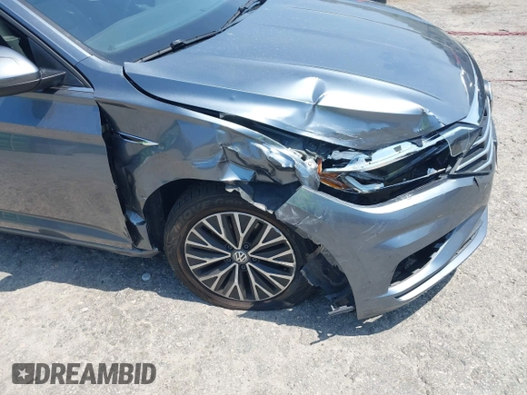 2019 Volkswagen Jetta SEL z VIN 3VWE57BU0KM110267, wystawiony jako IAAI lot #42161272 z przebiegiem 63 955 mil mil oraz . Historia ofert i sprzedaży dostępna na DreamBid. Obrazek 6.