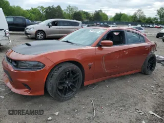 2020 Dodge Charger Scat Pack z VIN 2C3CDXGJ3LH242374, wystawiony jako Copart lot #54268305 z przebiegiem 59 159 mil mil oraz Szkody całkowita. Historia ofert i sprzedaży dostępna na DreamBid. Obrazek 1.