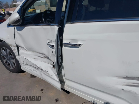 2015 Honda Odyssey Touring Elite with VIN 5FNRL5H91FB038099, listed as a IAAI auction lot 41829649 with 167,017 mi miles and . Bid and sale history available at DreamBid. Image 18.