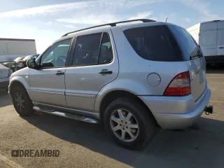 2000 Mercedes-Benz M-Class with VIN 4JGAB72E2YA185234, listed as a Copart auction lot 83479684 with 209,491 mi miles and Clean Title. Bid and sale history available at carsss.com. Image 2.