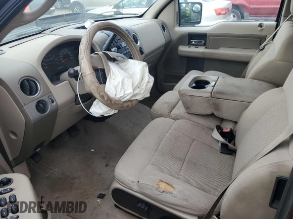 2005 Ford F-150 XL with VIN 1FTPX12595KD30384, listed as a Copart auction lot 77244603 with 170,086 mi miles and Salvage title. Bid and sale history available at DreamBid. Image 7.