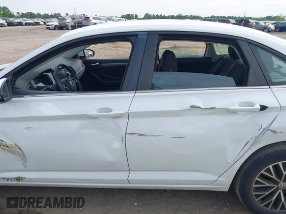 2021 Volkswagen Jetta S z VIN 3VWC57BU0MM021874, wystawiony jako IAAI lot #42124747 z przebiegiem 89 887 mil mil oraz . Historia ofert i sprzedaży dostępna na DreamBid. Obrazek 14.