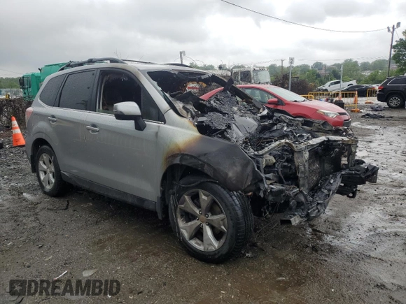 2014 Subaru Forester Touring with VIN JF2SJAPC3EH534700, listed as a Copart auction lot 56940105 with Not provided miles and Salvage title. Bid and sale history available at DreamBid. Image 4.
