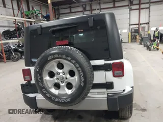 2014 Jeep Wrangler Sahara with VIN 1C4AJWBG7EL234625, listed as a IAAI auction lot 41726770 with 128,080 mi miles and . Bid and sale history available at DreamBid. Image 16.