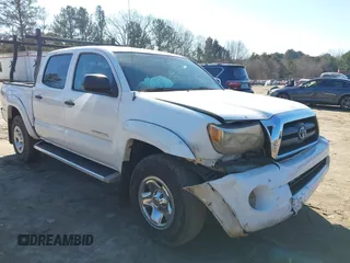 2009 Toyota Tacoma PreRunner with VIN 3TMJU62N79M078810, listed as a IAAI auction lot 41358051 with 154,001 mi miles. Bid and sale history available at carsss.com. Image 6.