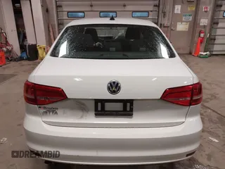 2015 Volkswagen Jetta Sedan 2.0L S with VIN 3VW2K7AJ1FM225534, listed as a IAAI auction lot 41941755 with 123,890 mi miles. Bid and sale history available at carsss.com. Image 16.