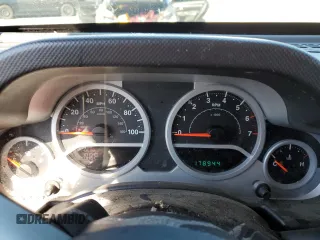 2008 Jeep Wrangler Unlimited Sahara with VIN 1J4GB59138L506461, listed as a Copart auction lot 75082664 with 178,944 mi miles and Salvage title. Bid and sale history available at DreamBid. Image 9.