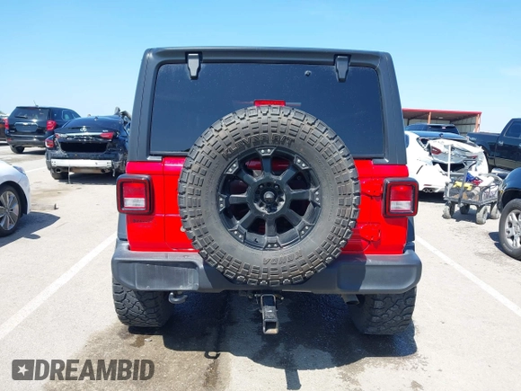 2018 Jeep Wrangler Unlimited Sport S z VIN 1C4HJXDGXJW168940, wystawiony jako IAAI lot #42200607 z przebiegiem 60 308 mil mil oraz . Historia ofert i sprzedaży dostępna na DreamBid. Obrazek 16.