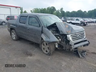 2013 Honda Ridgeline RTL with VIN 5FPYK1F56DB004834, listed as a IAAI auction lot 42706361 with 230,000 mi miles and . Bid and sale history available at DreamBid. Image 1.