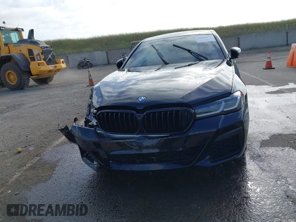 2023 BMW 5 Series 530e with VIN WBA13AG09PCL56556, listed as a IAAI auction lot 42098427 with Not provided miles and . Bid and sale history available at DreamBid. Image 12.