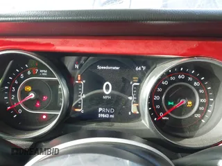 2020 Jeep Wrangler Unlimited Rubicon with VIN 1C4HJXFG1LW141335, listed as a IAAI auction lot 42724973 with 59,843 mi miles and . Bid and sale history available at DreamBid. Image 7.
