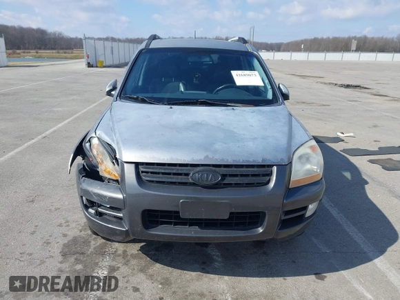 2005 Kia Sportage LX with VIN KNDJE723757102304, listed as a IAAI auction lot 41689073 with 125,276 mi miles and . Bid and sale history available at carsss.com. Image 13.