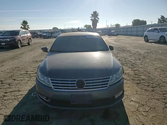 2013 Volkswagen CC Sport with VIN WVWBP7ANXDE525051, listed as a Copart auction lot 70659744 with 293,611 mi miles and Salvage Title. Bid and sale history available at DreamBid. Image 10.