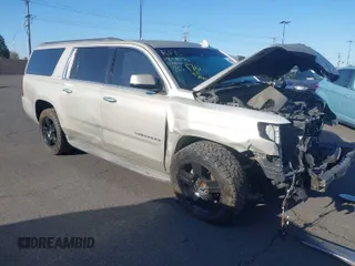 2015 Chevrolet Suburban LT with VIN 1GNSCJKC1FR608117, listed as a IAAI auction lot 41641560 with 163,770 mi miles. Bid and sale history available at carsss.com. Image 1.