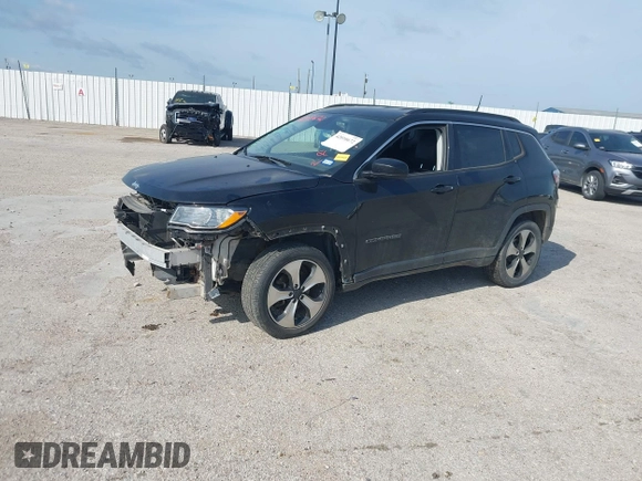 2018 Jeep Compass Latitude z VIN 3C4NJDBBXJT155149, wystawiony jako IAAI lot #42010672 z przebiegiem 81 784 mil mil oraz . Historia ofert i sprzedaży dostępna na DreamBid. Obrazek 14.