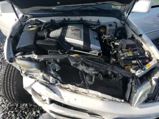 2006 Lexus LX 470 z VIN JTJHT00W864007291, wystawiony jako Copart lot #57331555 z przebiegiem 142 194 mil mil oraz Szkody całkowita. Historia ofert i sprzedaży dostępna na DreamBid. Obrazek 12.
