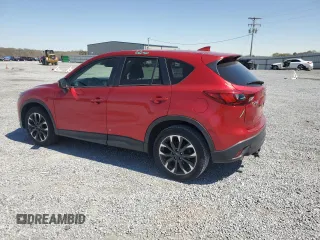 2016 Mazda CX-5 Grand Touring z VIN JM3KE2DYXG0840777, wystawiony jako Copart lot #49700585 z przebiegiem 116 469 mil mil oraz Szkoda całkowita • Salvage title. Historia ofert i sprzedaży dostępna na DreamBid. Obrazek 2.