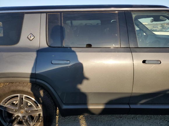 2025 Rivian R1S Adventure with VIN 7PDSGBBA6SN048784, listed as a Copart auction lot 42385665 with Not Provided miles and Salvage Title. Bid and sale history available at carsss.com. Image 11.