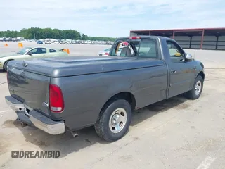 2002 Ford F-150 XL with VIN 1FTRF17W22NA77707, listed as a IAAI auction lot 42291542 with Not provided miles and . Bid and sale history available at DreamBid. Image 4.
