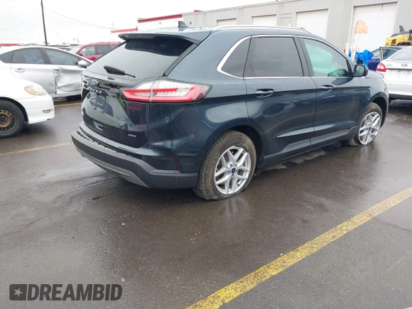 2022 Ford Edge SEL z VIN 2FMPK4J90NBA71360, wystawiony jako IAAI lot #41724316 z przebiegiem 35 309 mil mil oraz . Historia ofert i sprzedaży dostępna na DreamBid. Obrazek 4.
