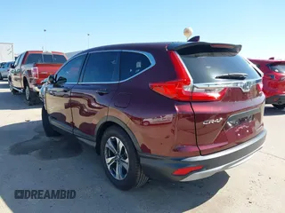 2019 Honda CR-V LX with VIN 2HKRW5H38KH409192, listed as a IAAI auction lot 41963242 with 38,114 mi miles. Bid and sale history available at carsss.com. Image 3.