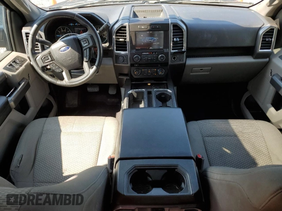 2015 Ford F-150 XLT with VIN 1FTEW1EP7FKE12574, listed as a Copart auction lot 59519985 with 133,337 mi miles and Salvage title. Bid and sale history available at DreamBid. Image 8.
