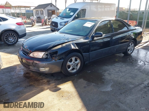 1997 Lexus ES 300 Luxury Sport Sdn with VIN JT8BF22GXV5003056, listed as a IAAI auction lot 41806886 with 130,063 mi miles. Bid and sale history available at carsss.com. Image 19.