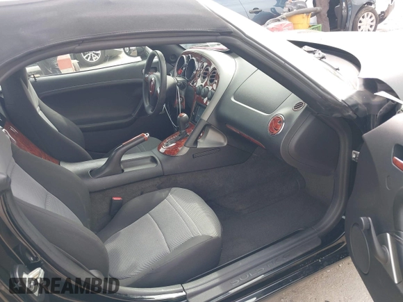 2007 Pontiac Solstice z VIN 1G2MB35B87Y135895, wystawiony jako IAAI lot #41733986 z przebiegiem 50 109 mil mil oraz . Historia ofert i sprzedaży dostępna na DreamBid. Obrazek 5.