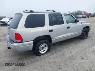 1999 Dodge Durango with VIN 1B4HR28YXXF517034, listed as a IAAI auction lot 41556485 with 208,998 mi miles and . Bid and sale history available at DreamBid. Image 4.