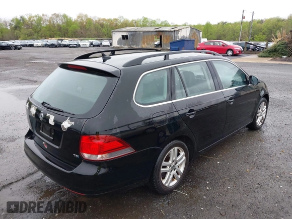 2014 Volkswagen Jetta SportWagen TDI with VIN 3VWML7AJ4EM611160, listed as a IAAI auction lot 41908412 with 149,267 mi miles. Bid and sale history available at carsss.com. Image 4.
