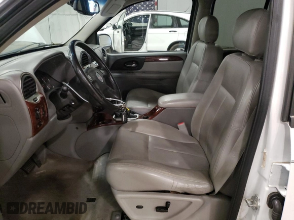 2009 GMC Envoy SLT with VIN 1GKDT43S492124405, listed as a Copart auction lot 81337354 with 154,045 mi miles and Salvage Title. Bid and sale history available at carsss.com. Image 7.