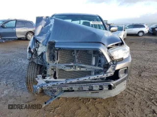 2017 Toyota Tacoma SR z VIN 5TFAX5GN8HX087468, wystawiony jako Copart lot #49354265 z przebiegiem 156 991 mil mil oraz Szkoda całkowita • Salvage title. Historia ofert i sprzedaży dostępna na DreamBid. Obrazek 5.
