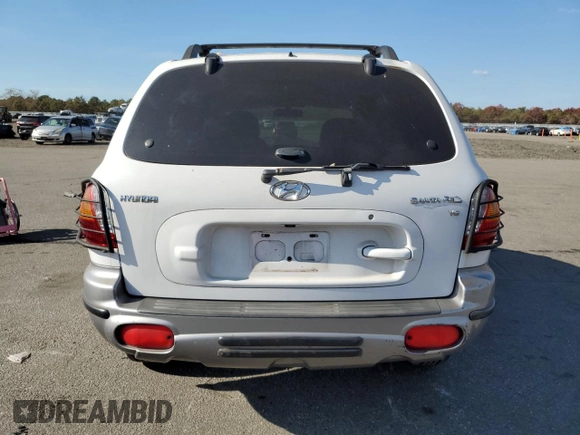 2002 Hyundai Santa Fe GLS with VIN KM8SC13D42U162953, listed as a Copart auction lot 77953044 with 98,463 mi miles and Clean Title. Bid and sale history available at carsss.com. Image 6.