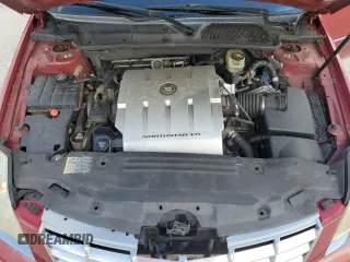 2006 Cadillac DTS 1SC z VIN 1G6KD57Y86U199826, wystawiony jako Copart lot #71582074 z przebiegiem 170 583 mil mil oraz Szkoda całkowita • Salvage title. Historia ofert i sprzedaży dostępna na DreamBid. Obrazek 11.
